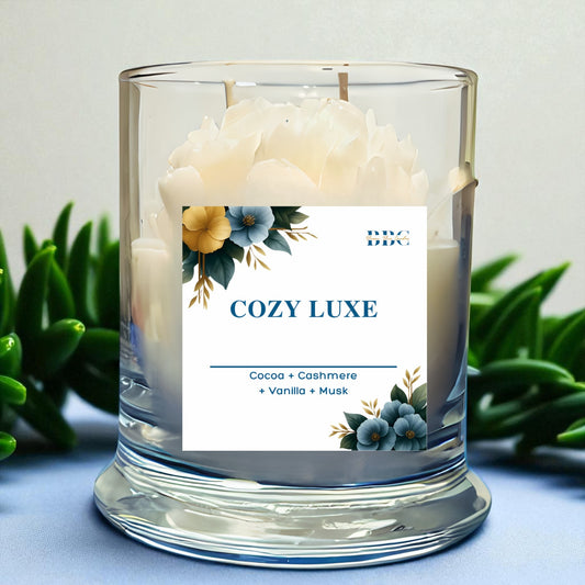 Warm cozy candle with cocoa and vanilla